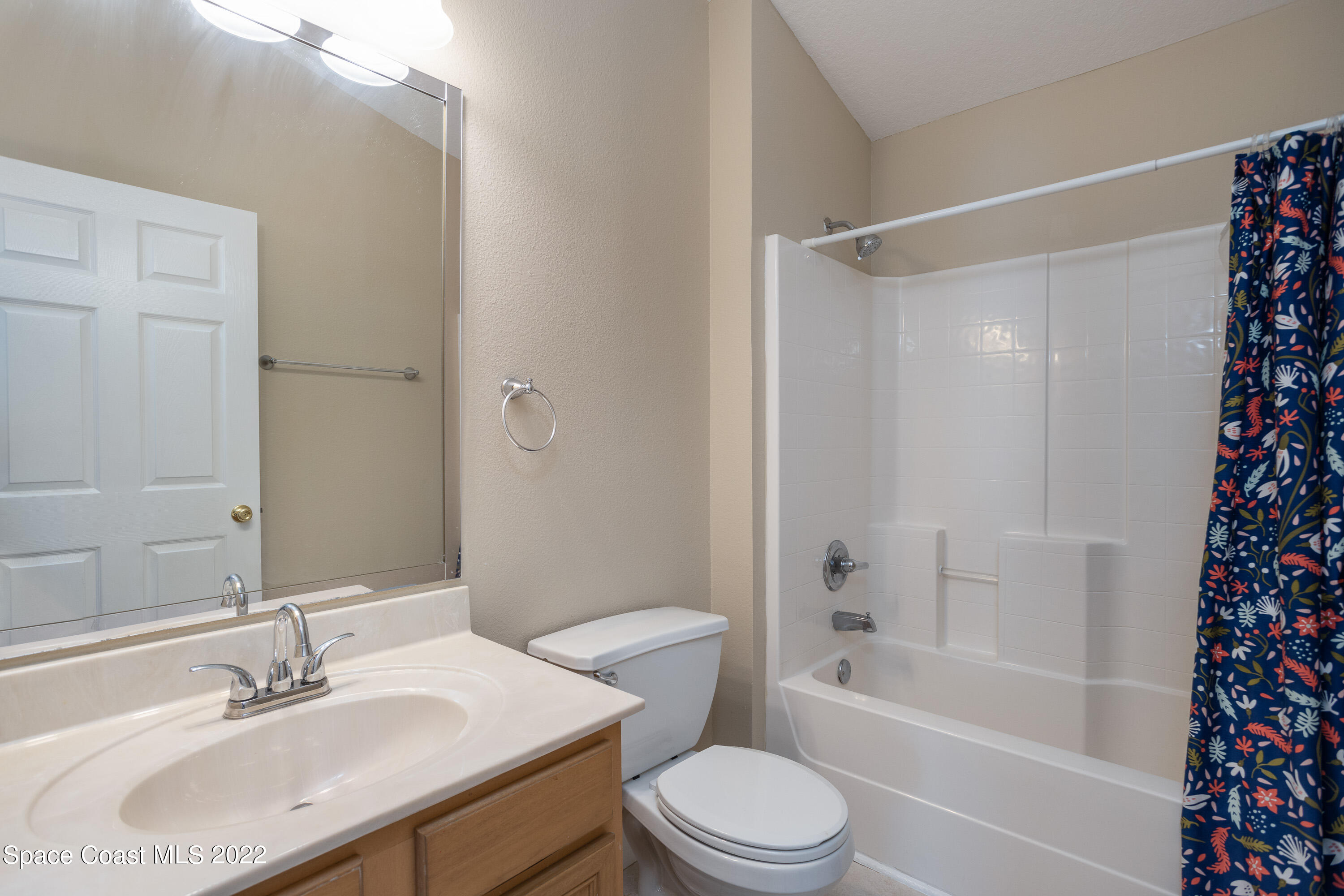 2400 Bridgeport Circle Rockledge, FL 32955 - Photo 21 of 31 a bathroom with a sink toilet and shower