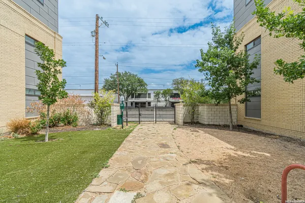 a view of a back yard of the house
