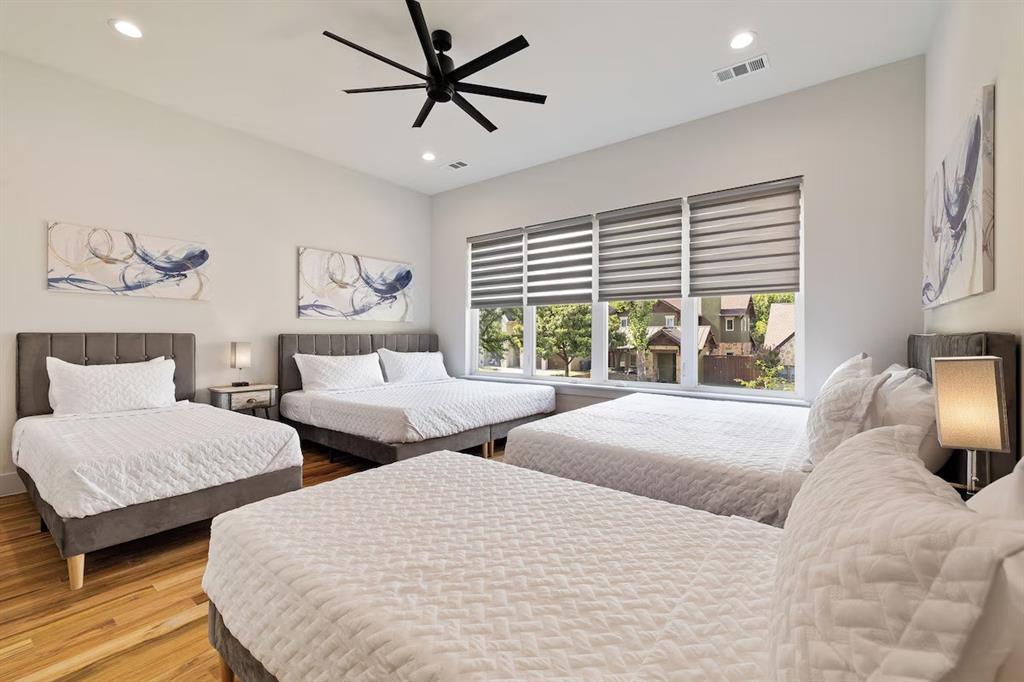 5942 Prospect Avenue Dallas, TX 75206 - Photo 16 of 25 Bedroom featuring wood finished floors, recessed lighting, and a ceiling fan