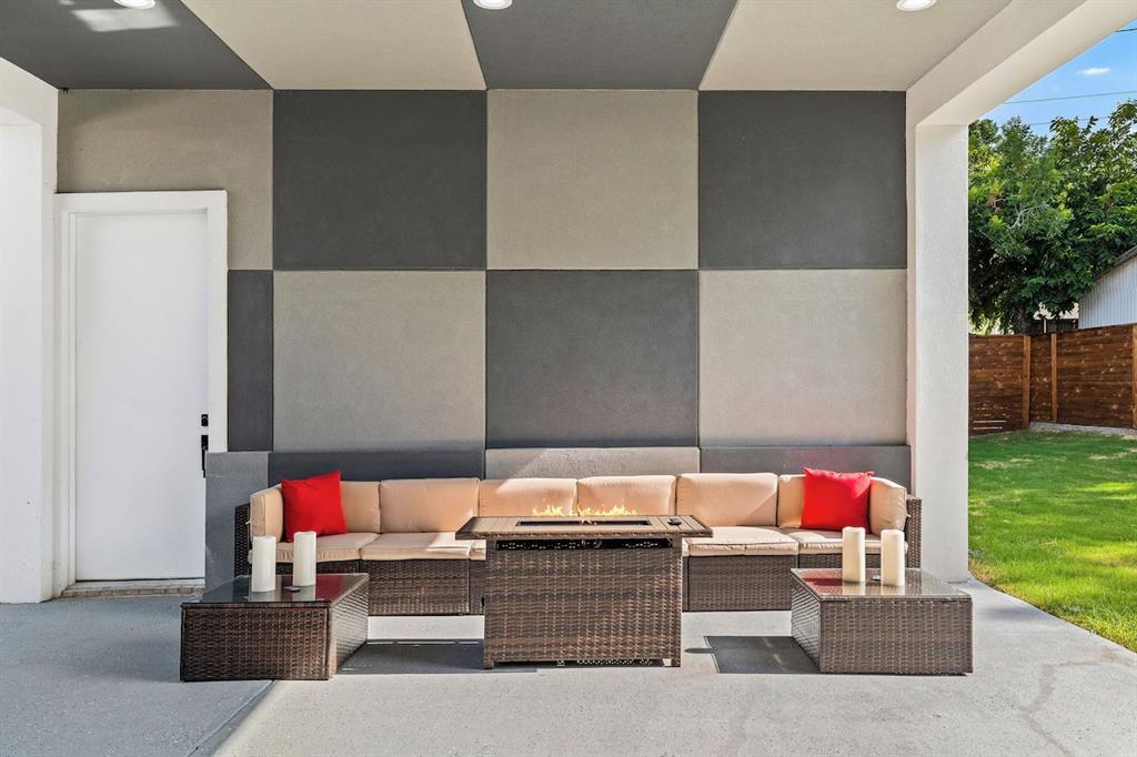 5942 Prospect Avenue Dallas, TX 75206 - Photo 23 of 25 View of patio / terrace featuring an outdoor living space with a fire pit