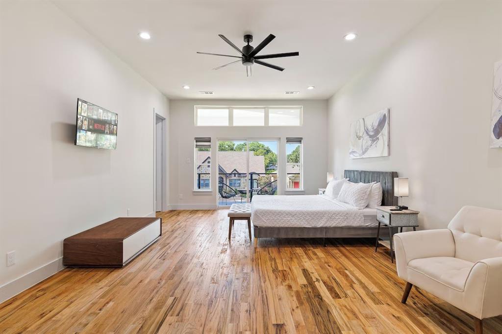 5942 Prospect Avenue Dallas, TX 75206 - Photo 7 of 25 Bedroom featuring recessed lighting, access to outside, light wood-type flooring, and ceiling fan