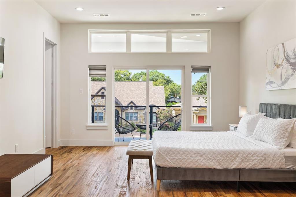 5942 Prospect Avenue Dallas, TX 75206 - Photo 8 of 25 Bedroom with wood finished floors, recessed lighting, and access to exterior