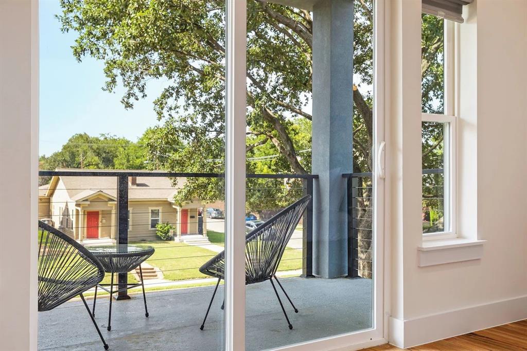 5942 Prospect Avenue Dallas, TX 75206 - Photo 9 of 25 Entryway featuring wood finished floors and baseboards