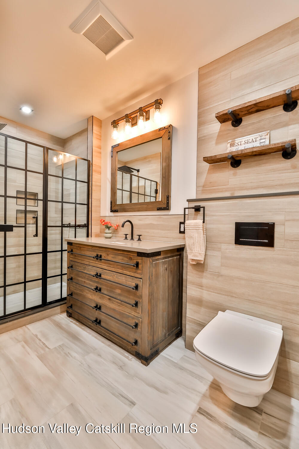 37 Notch View Road Lexington, NY 12468 - Photo 36 of 71 a bathroom with a sink a mirror and a shower