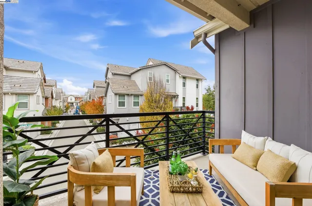 a view of balcony with furniture