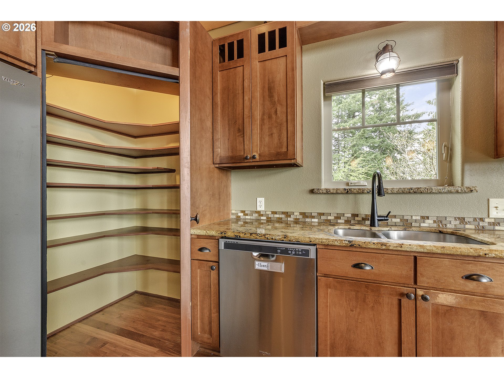 16860 Hoffman Avenue Sandy, OR 97055 - Photo 12 of 47 a kitchen with a sink and a window