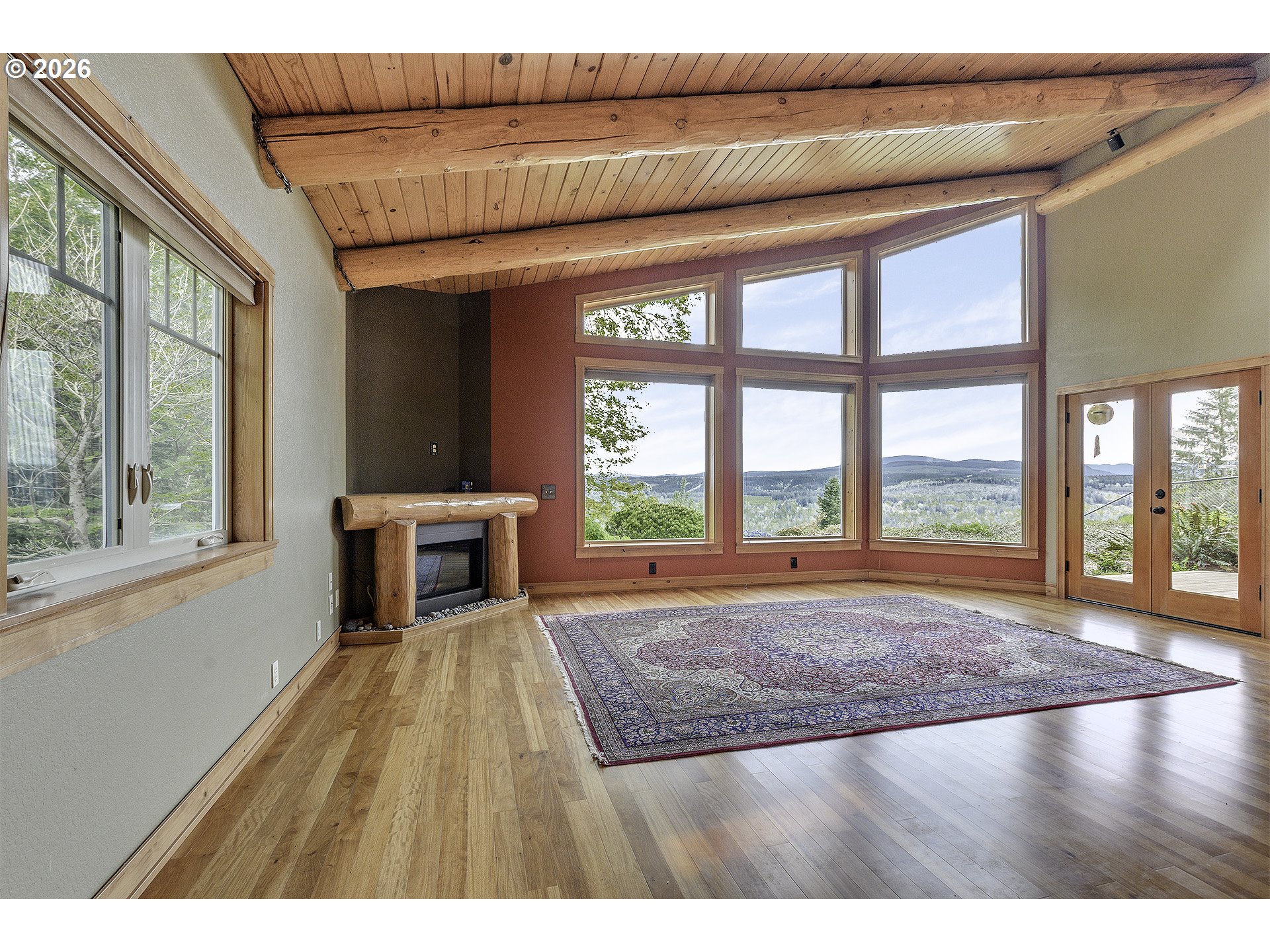16860 Hoffman Avenue Sandy, OR 97055 - Photo 14 of 47 a living room with a large window and a table