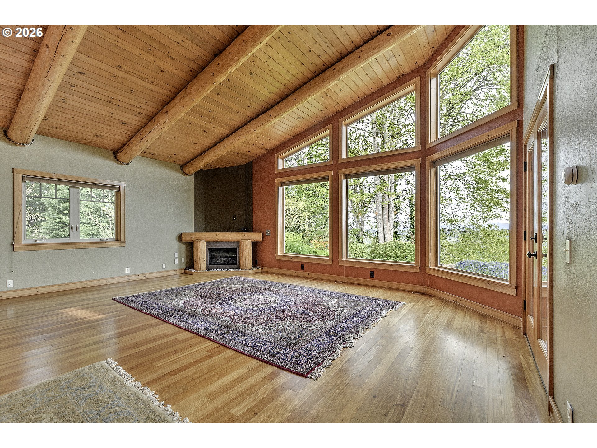 16860 Hoffman Avenue Sandy, OR 97055 - Photo 16 of 47 a view of empty room with wooden floor and fan