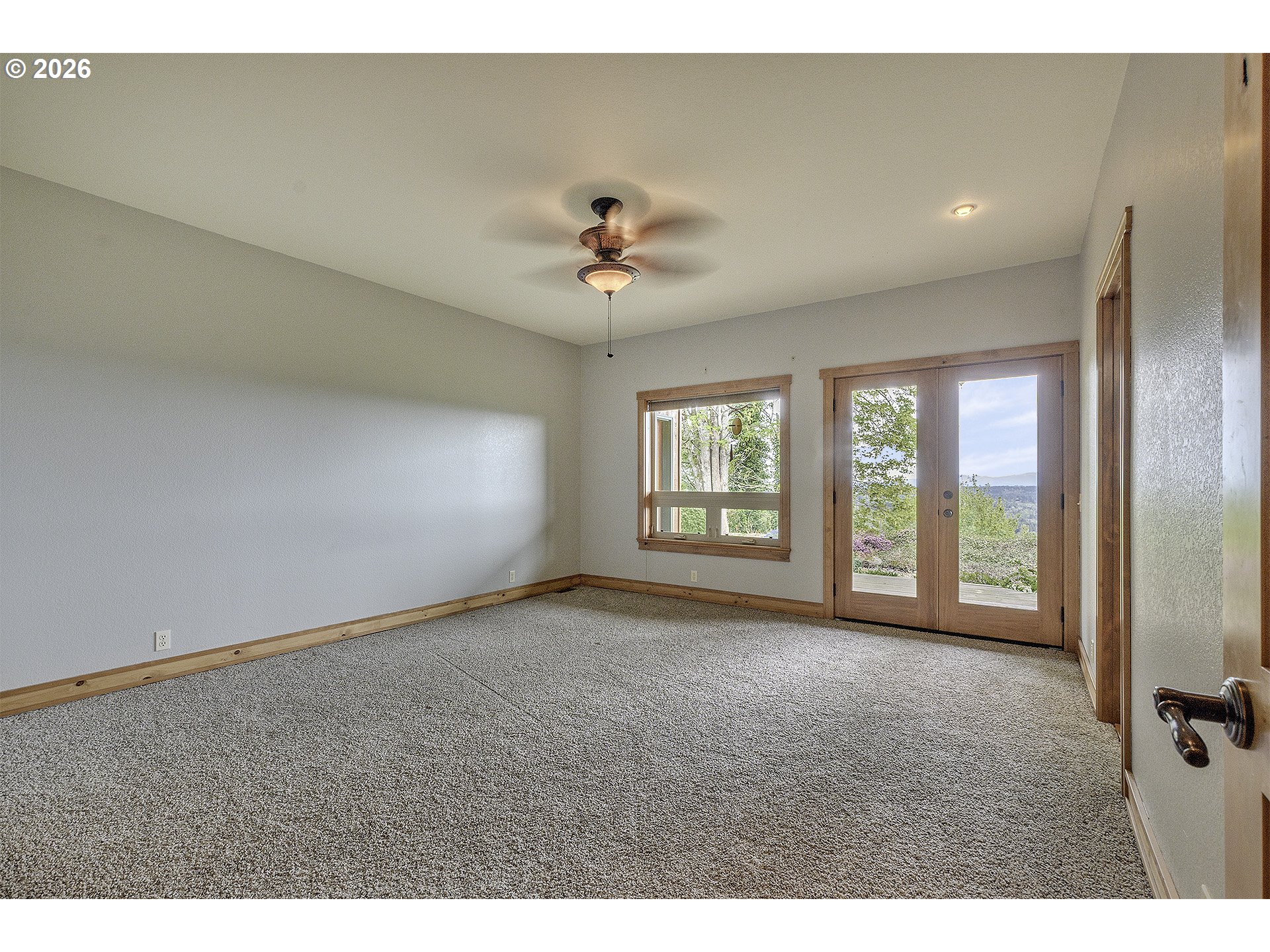 16860 Hoffman Avenue Sandy, OR 97055 - Photo 18 of 47 a view of an empty room with a window