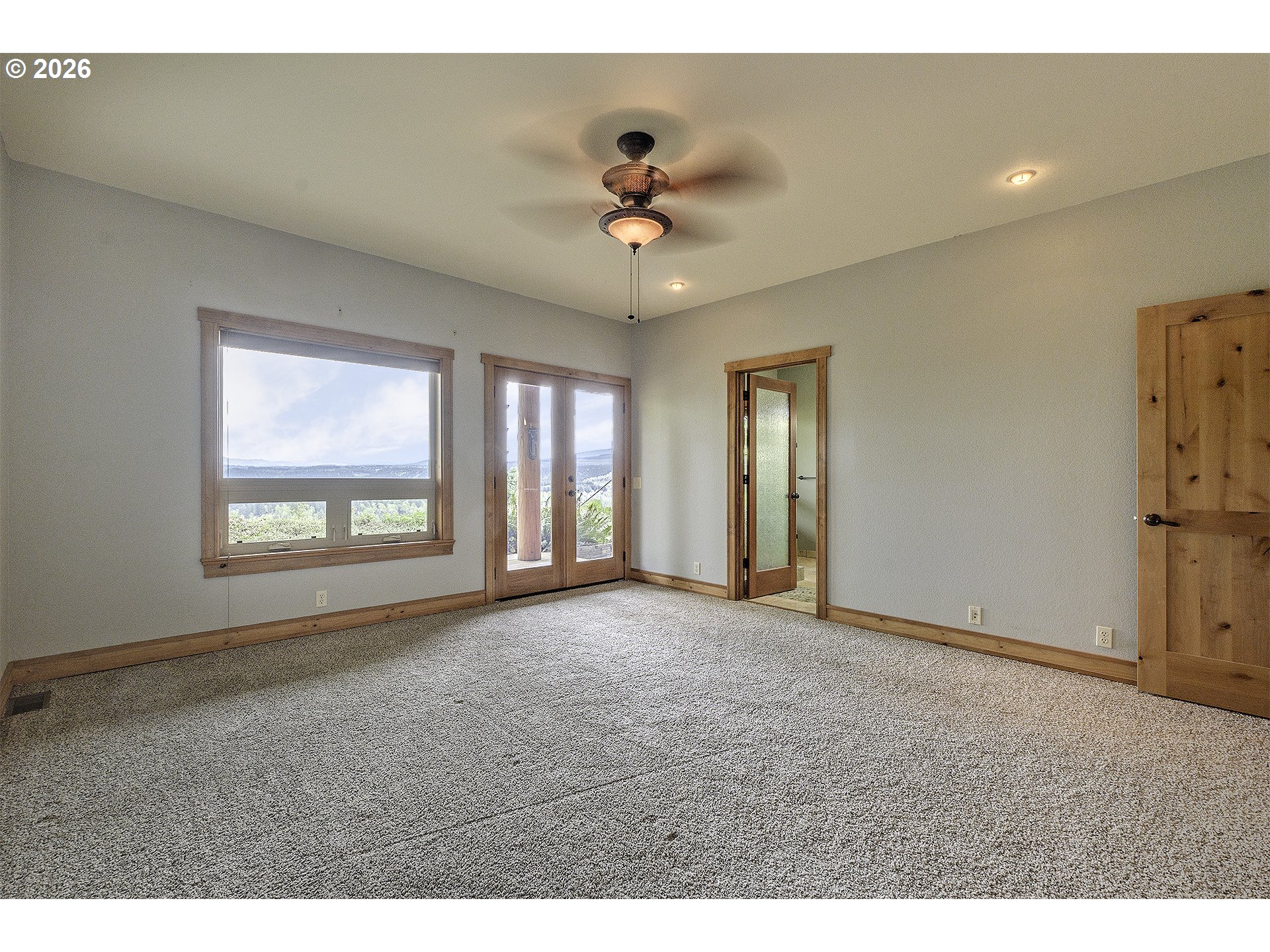 16860 Hoffman Avenue Sandy, OR 97055 - Photo 19 of 47 a view of an empty room with a window