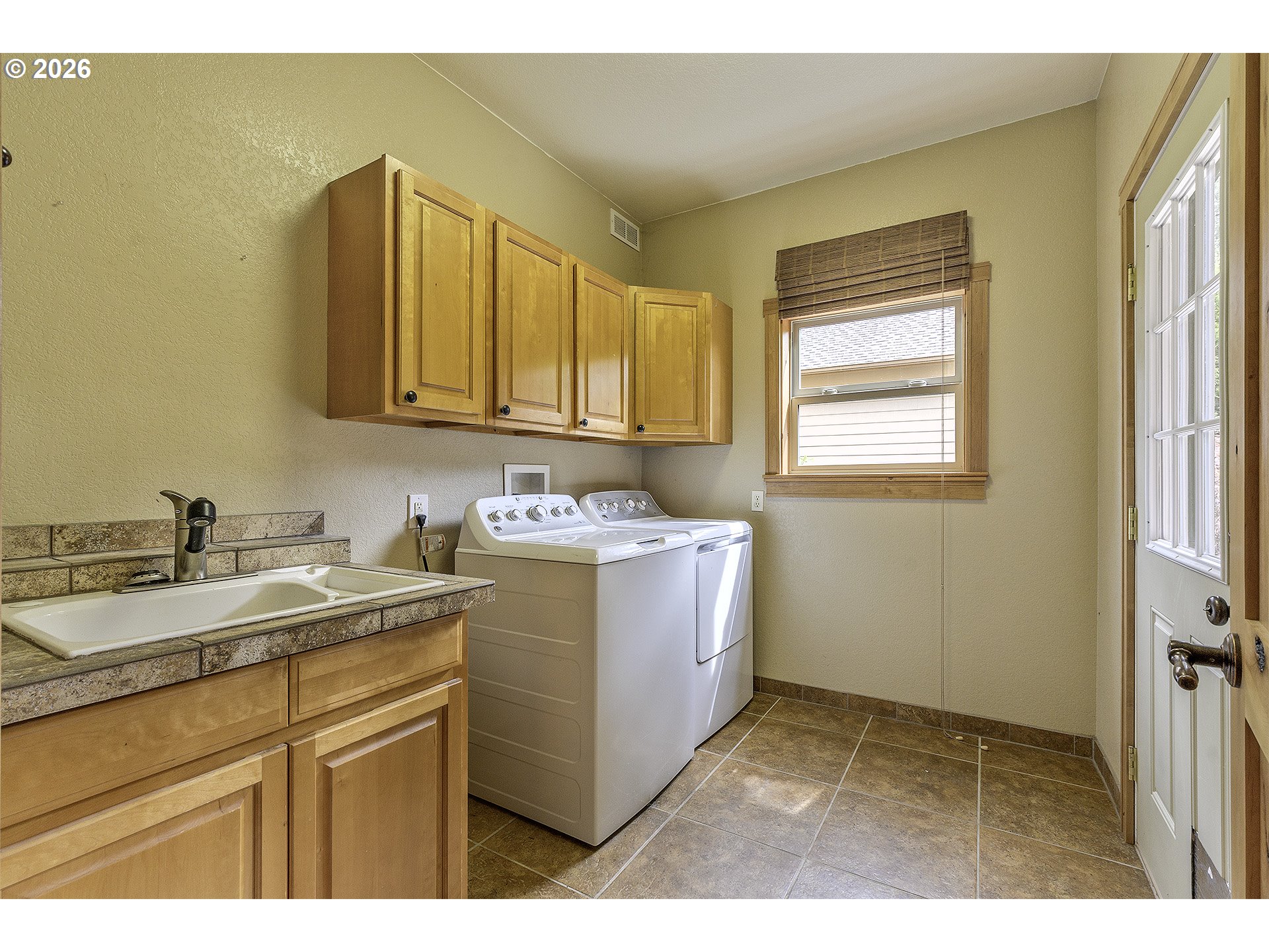 16860 Hoffman Avenue Sandy, OR 97055 - Photo 23 of 47 a utility room with a sink washer and dryer