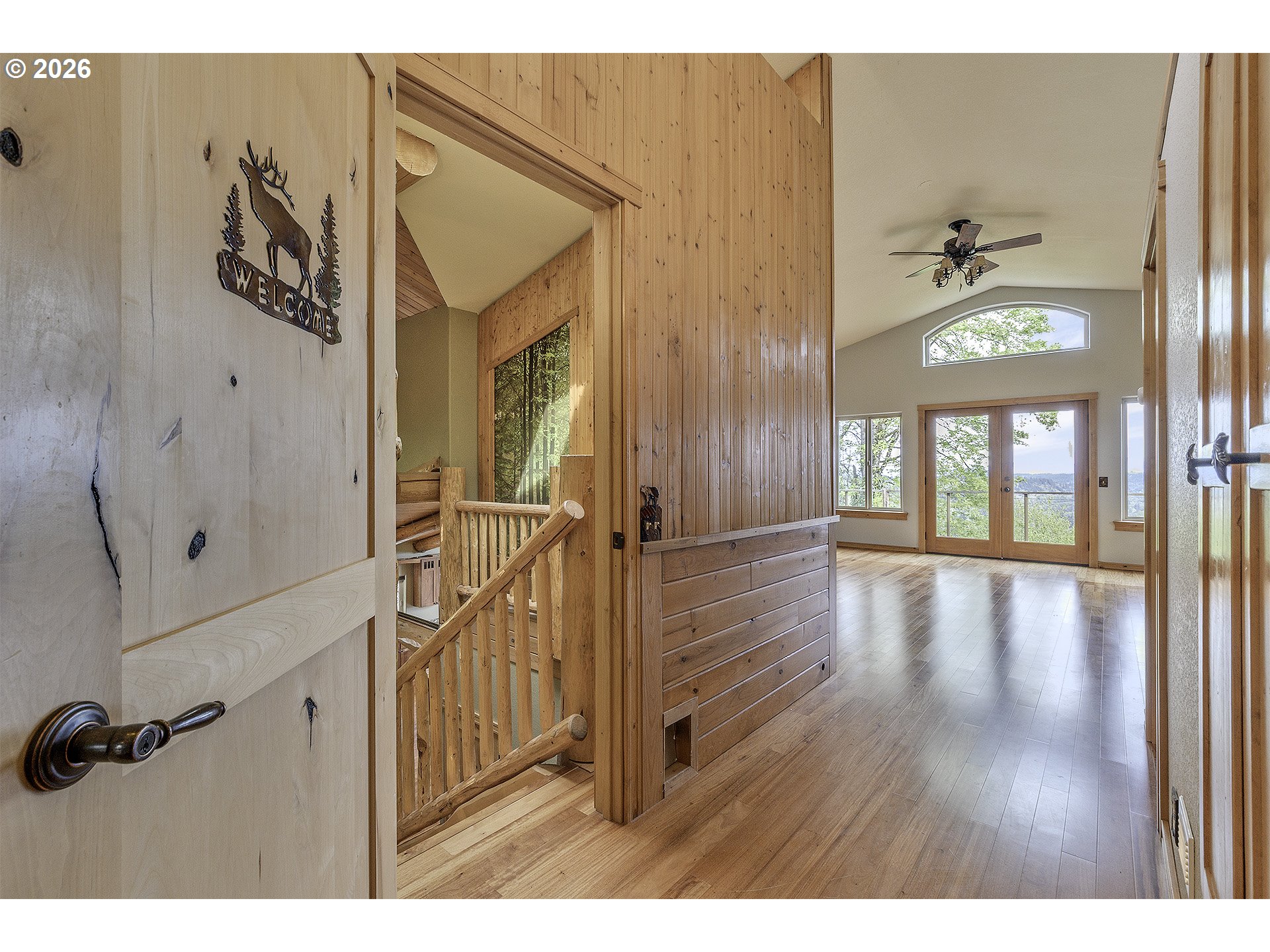 16860 Hoffman Avenue Sandy, OR 97055 - Photo 26 of 47 a view of a hallway with wooden floor and a bathroom