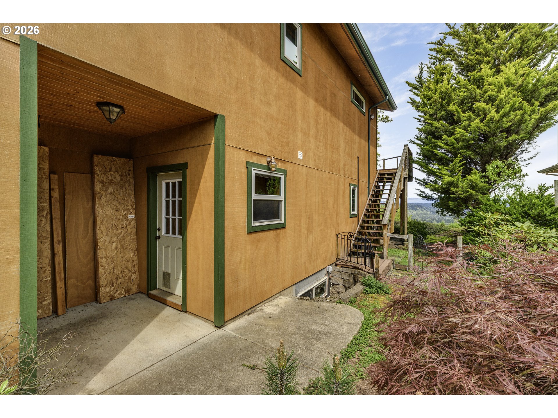 16860 Hoffman Avenue Sandy, OR 97055 - Photo 46 of 47 a view of a house with backyard