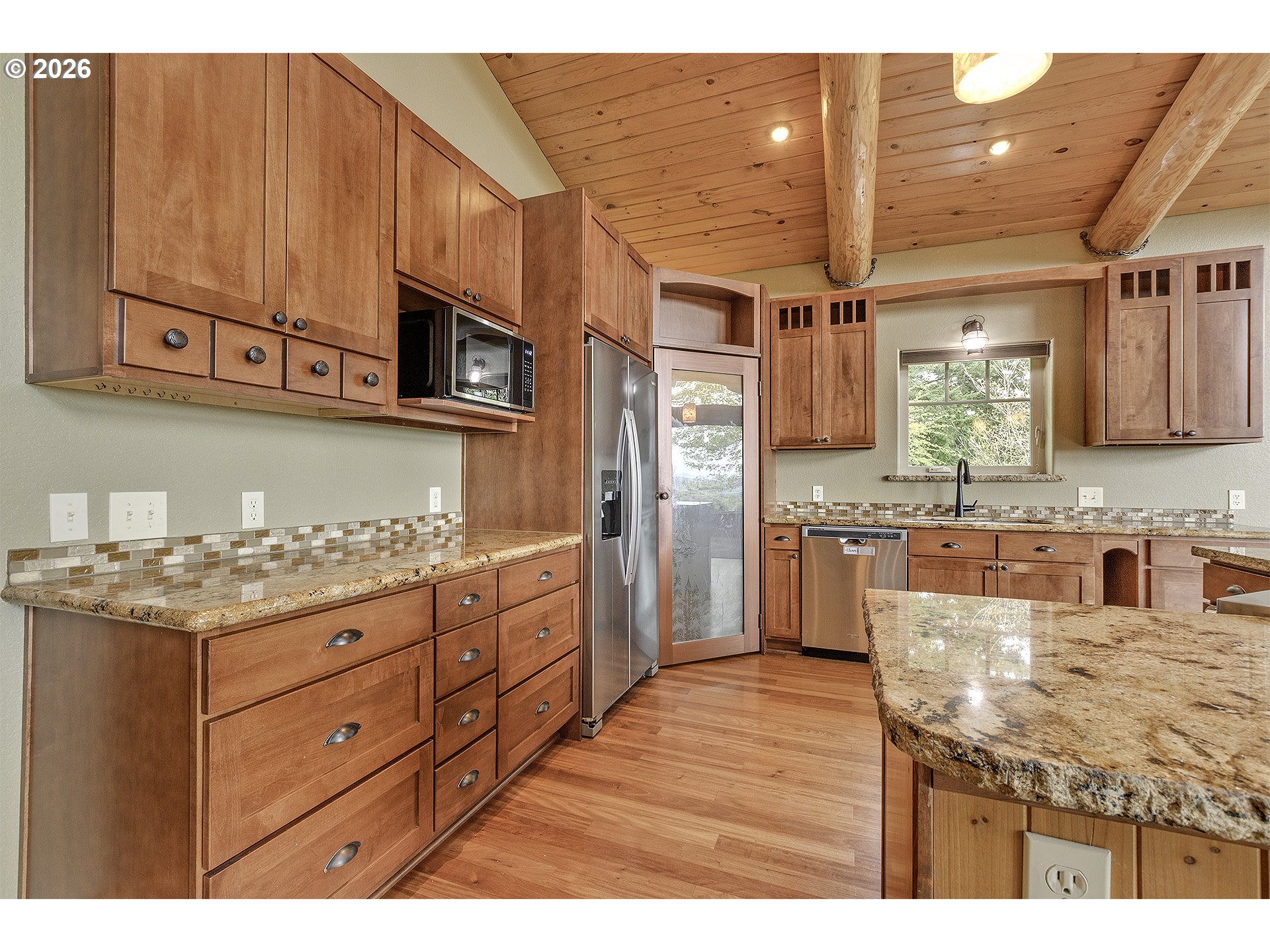 16860 Hoffman Avenue Sandy, OR 97055 - Photo 8 of 47 a kitchen with stainless steel appliances granite countertop a sink and cabinets