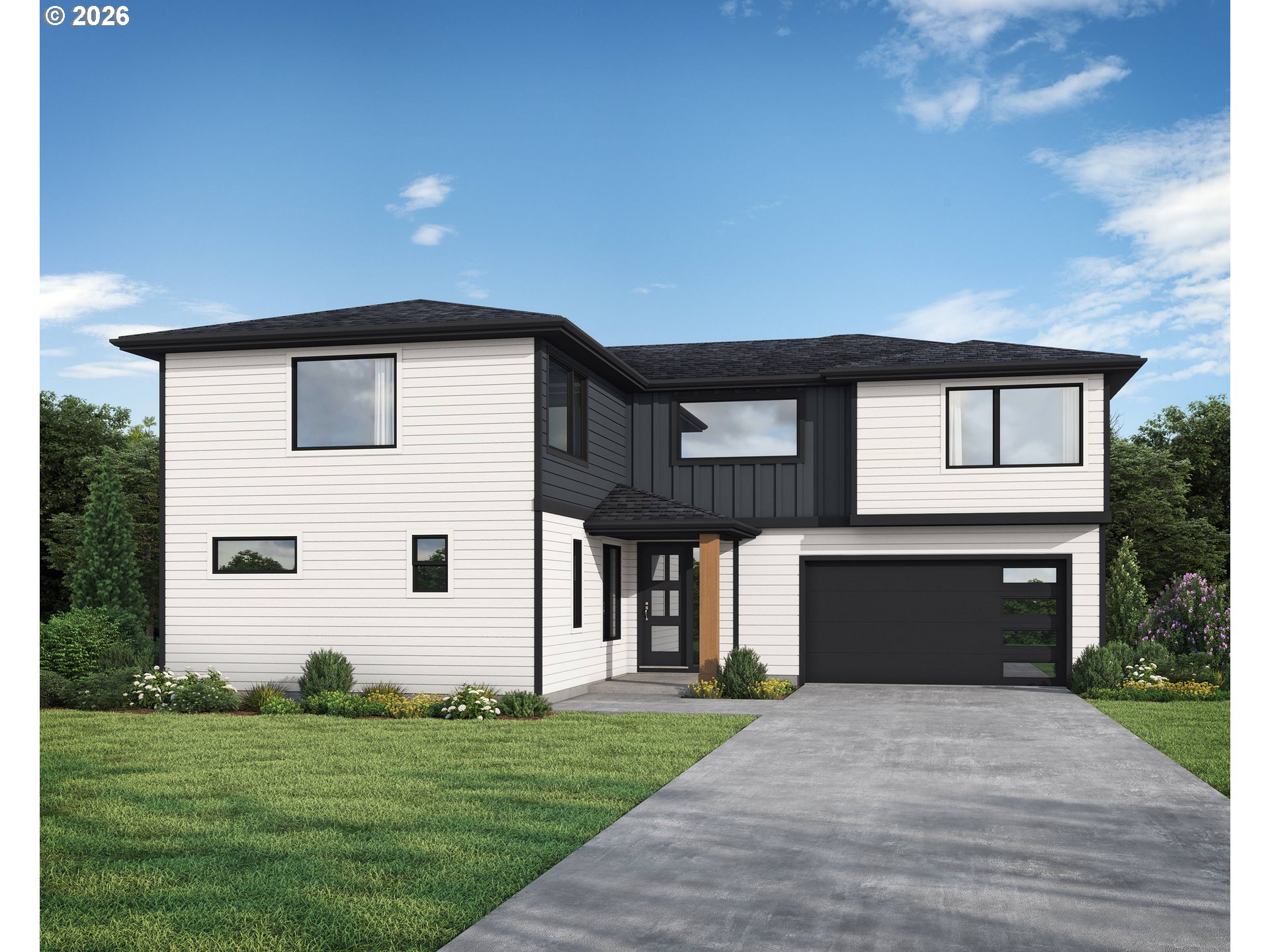 a front view of a house with a yard and garage