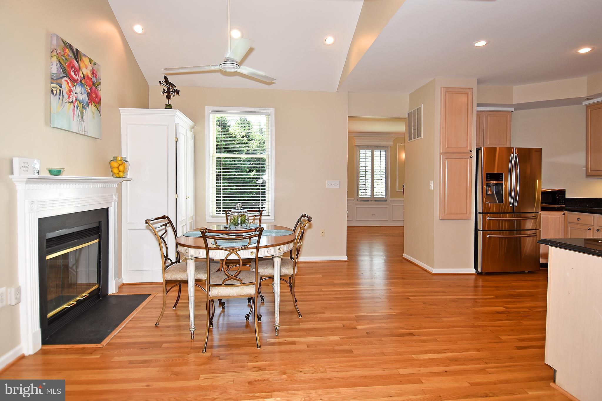 2763 Cody Road Vienna, VA 22181 - Photo 8 of 30 Table Space off Kitchen with Fireplace