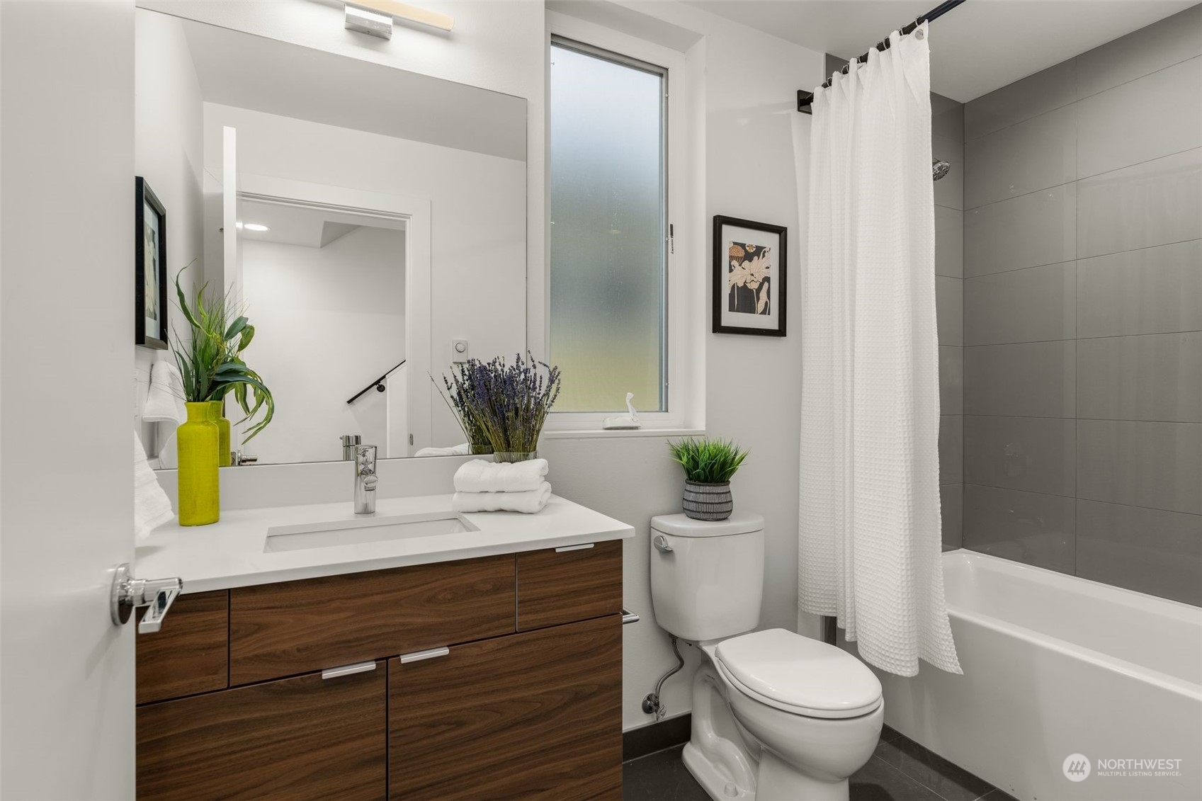 2440 55th Avenue Southwest Seattle, WA 98116 - Photo 18 of 30 a bathroom with a sink toilet and shower