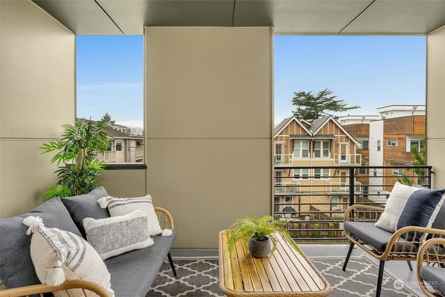 a view of a livingroom with furniture