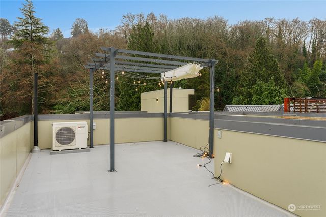 a front view of a house with garage