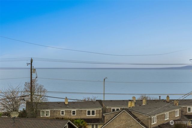 a view of a house with a ocean view