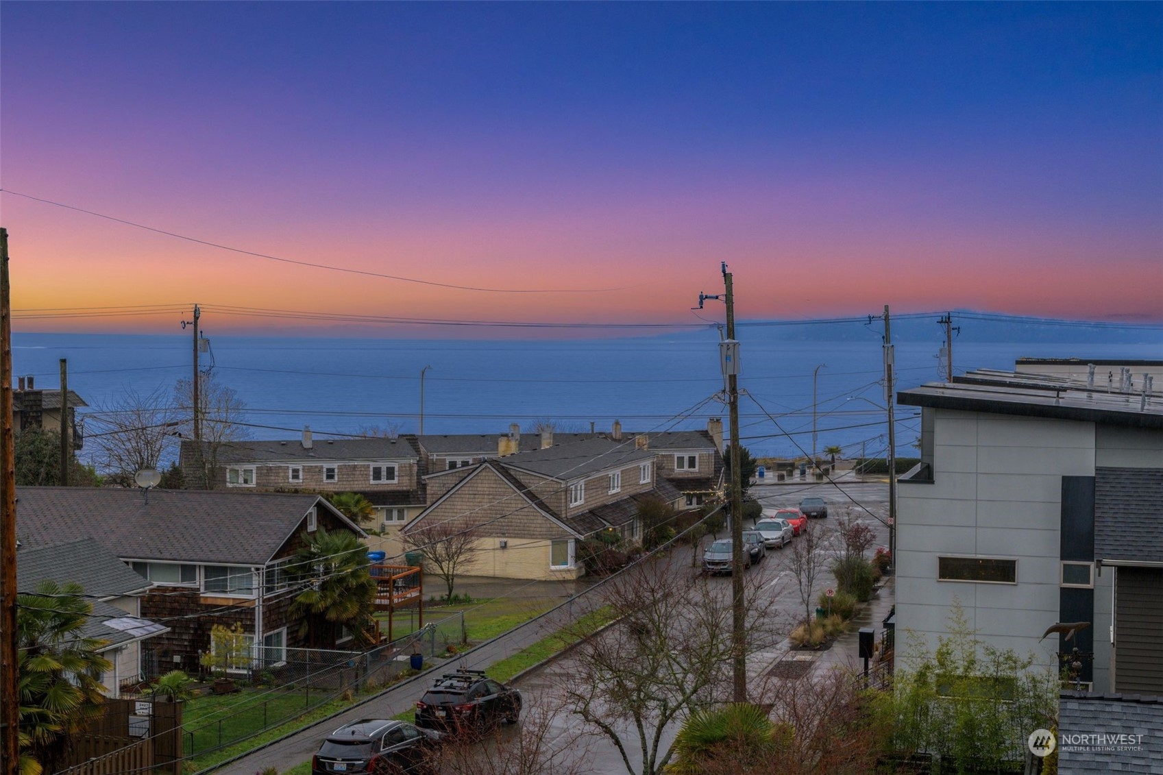 2440 55th Avenue Southwest Seattle, WA 98116 - Photo 29 of 30 a view of a house with a ocean view