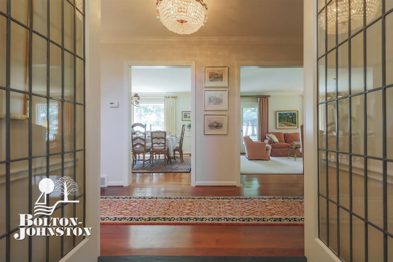 227 Lake Shore Road Grosse Pointe, MI 48236 - Photo 3 of 48 Front entrance foyer offers slate flooring and guest closet and stunning leaded glass doors.