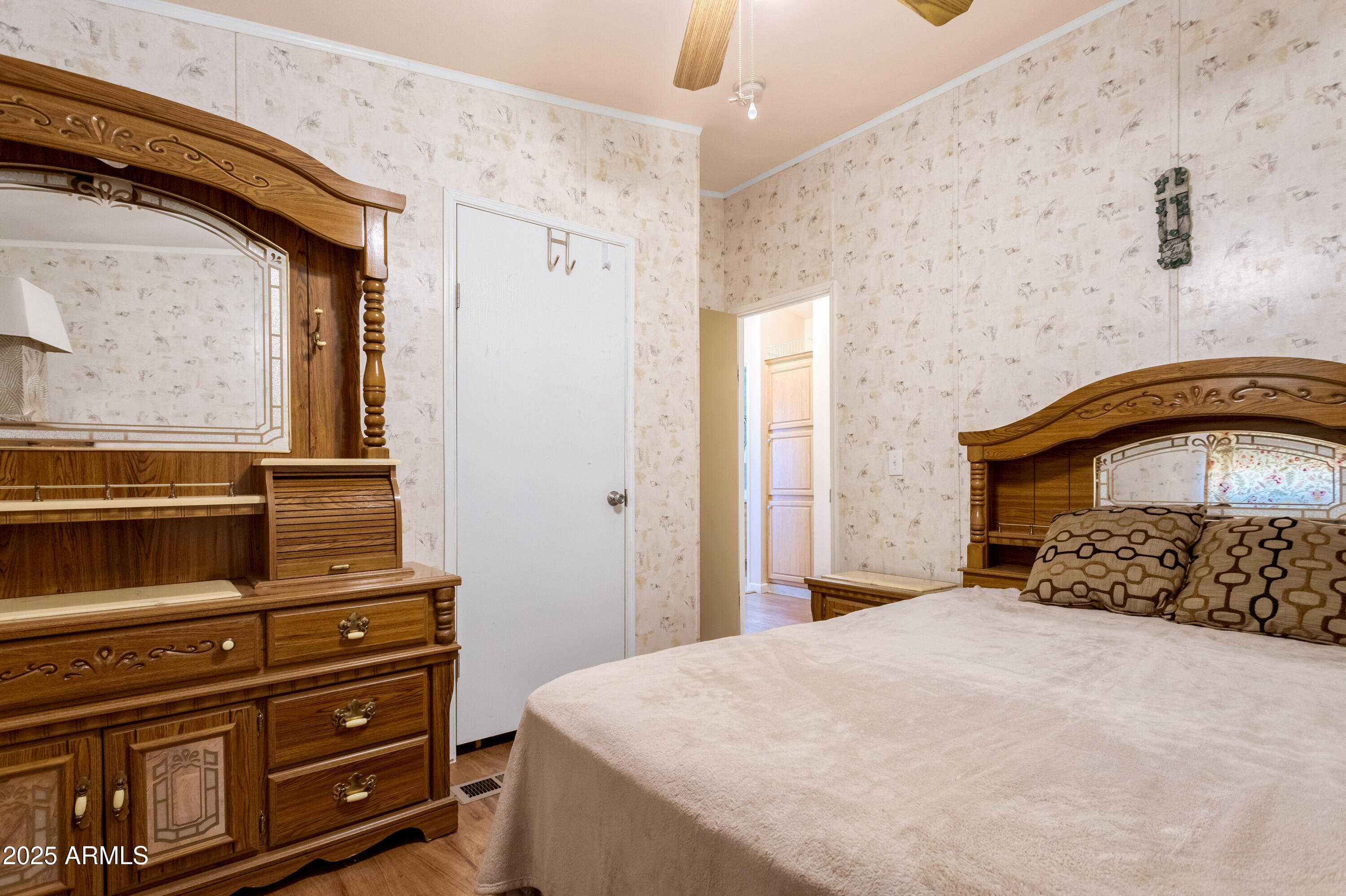 1907 East Vía Ocotillo Douglas, AZ 85607 - Photo 19 of 49 a bedroom with a bed and a dresser
