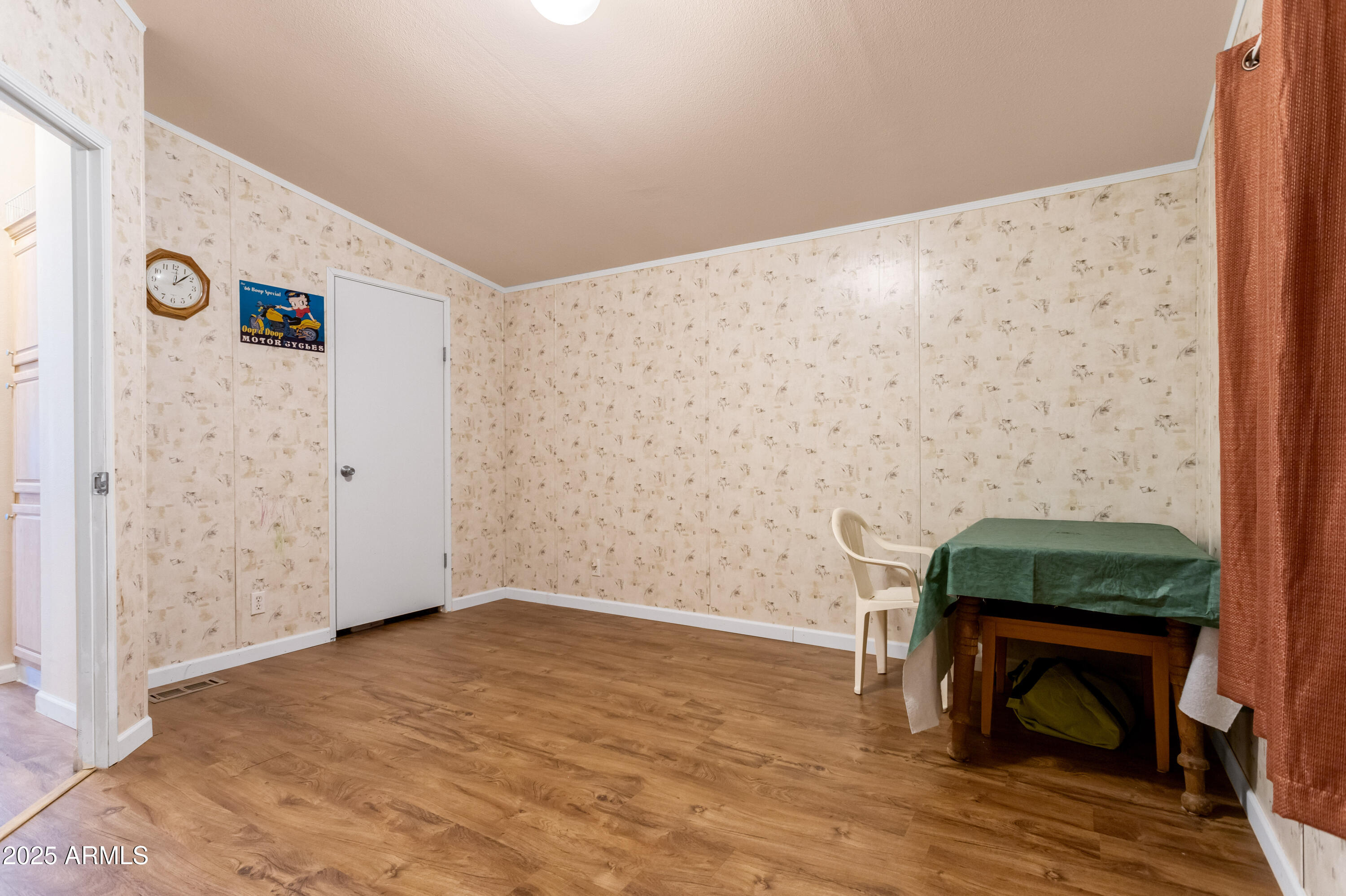 1907 East Vía Ocotillo Douglas, AZ 85607 - Photo 25 of 49 a view of livingroom with furniture and wooden floor