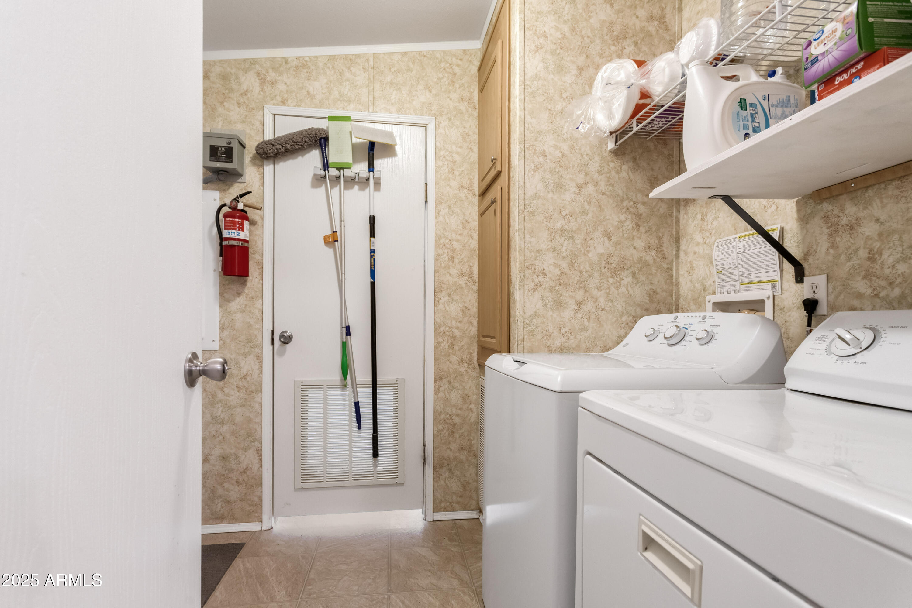 1907 East Vía Ocotillo Douglas, AZ 85607 - Photo 26 of 49 a utility room with dryer and washer