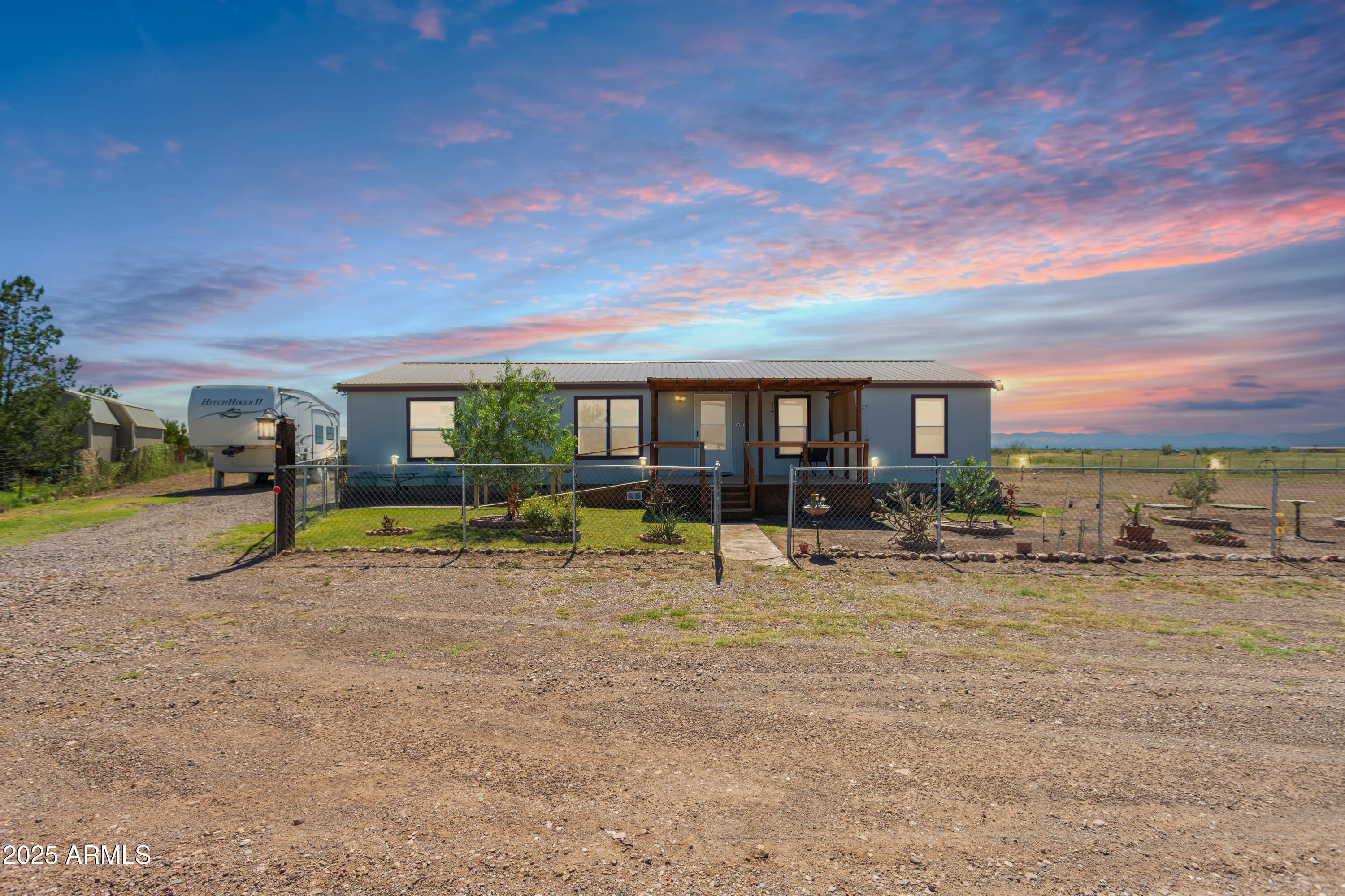 1907 East Vía Ocotillo Douglas, AZ 85607 - Photo 3 of 49 a view of a house with swimming pool and sitting area