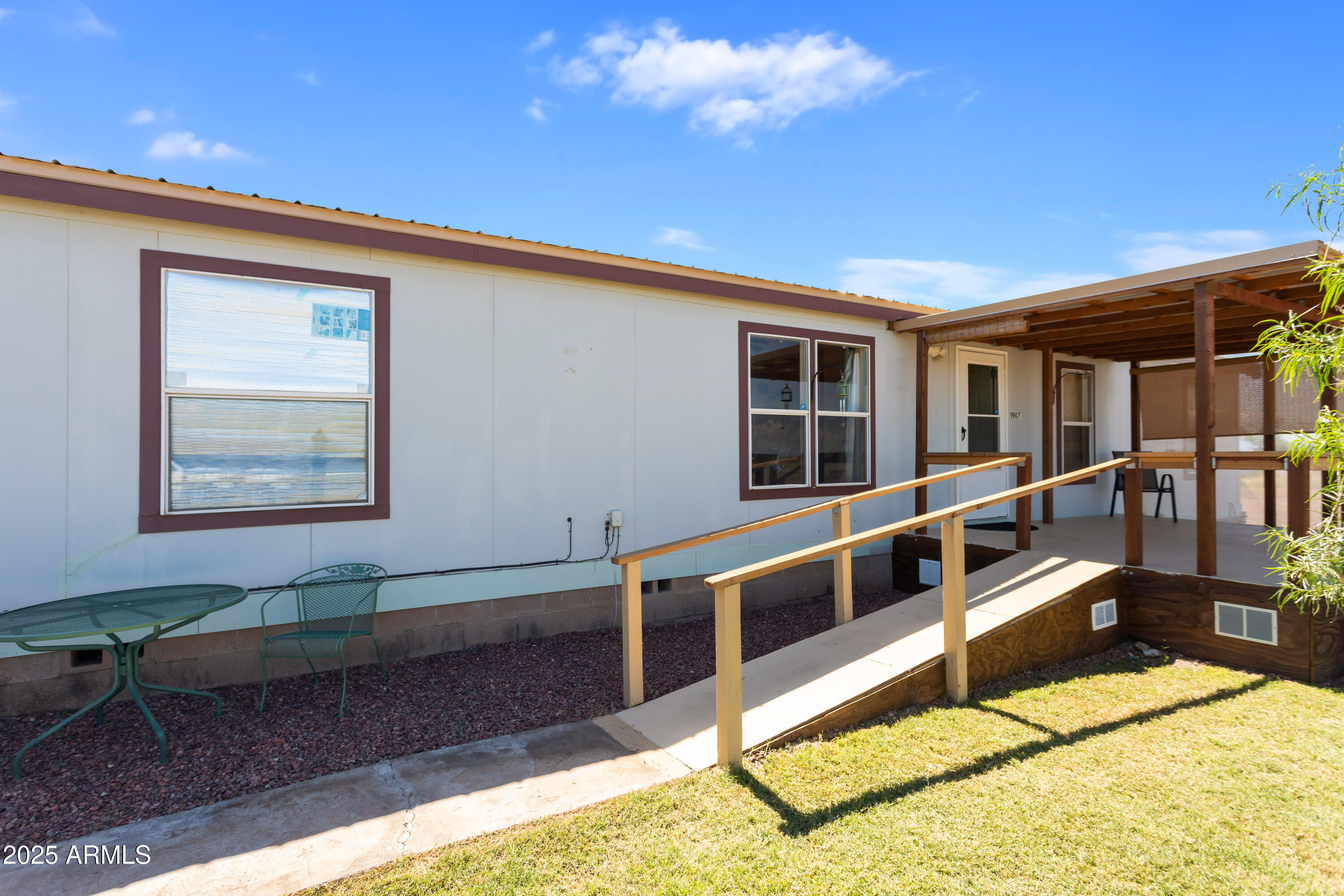 1907 East Vía Ocotillo Douglas, AZ 85607 - Photo 34 of 49 a view of a house with wooden deck