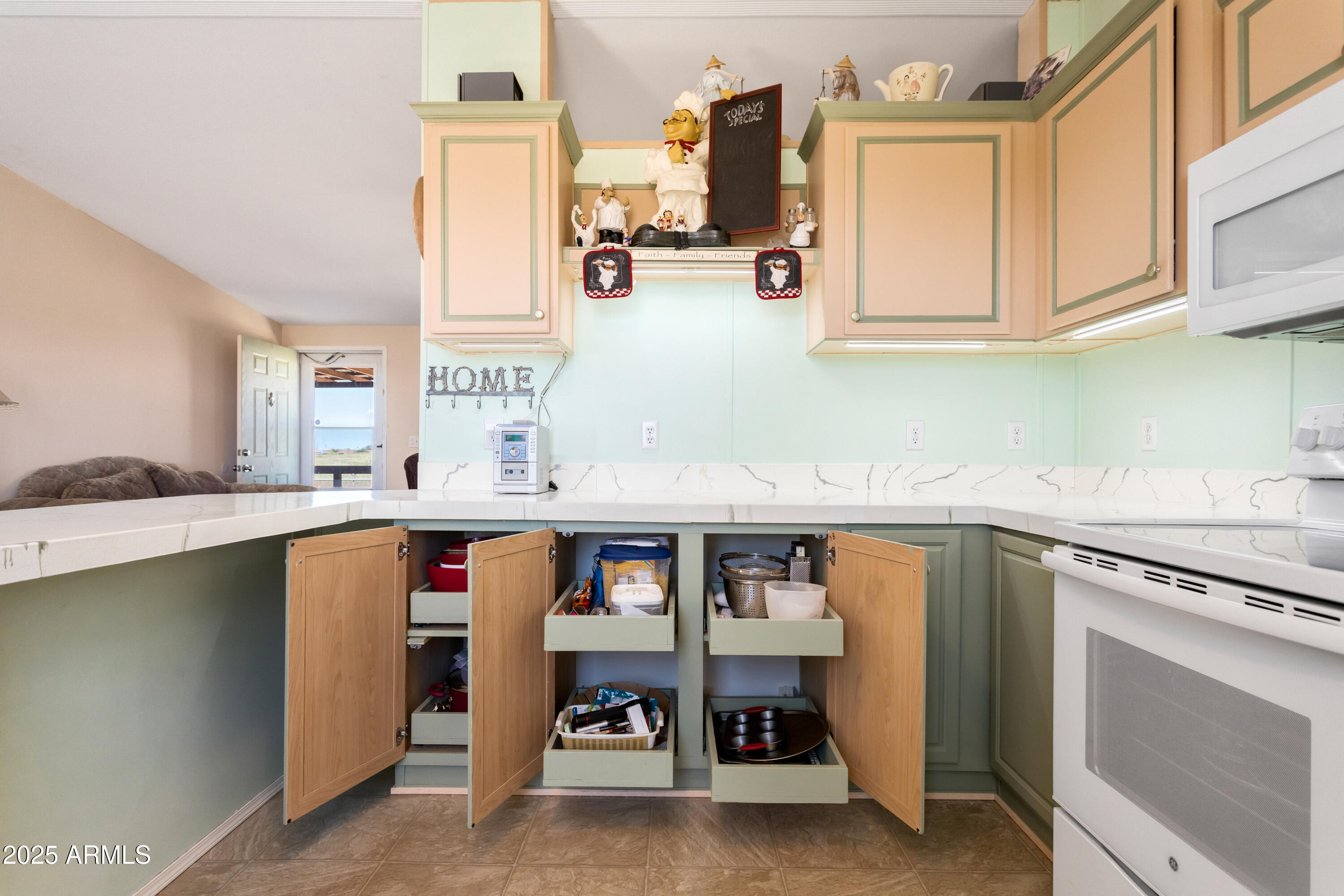 1907 East Vía Ocotillo Douglas, AZ 85607 - Photo 8 of 49 a kitchen with cabinets and window