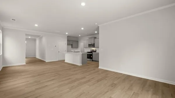 a view of kitchen with wooden floor