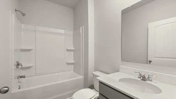 a bathroom with a sink toilet and bathtub