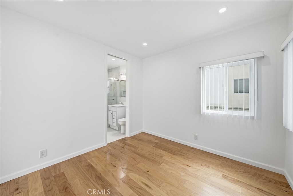 220 39th Street, Unit B Manhattan Beach, CA 90266 - Photo 11 of 21 a view of empty room with wooden floor and fan