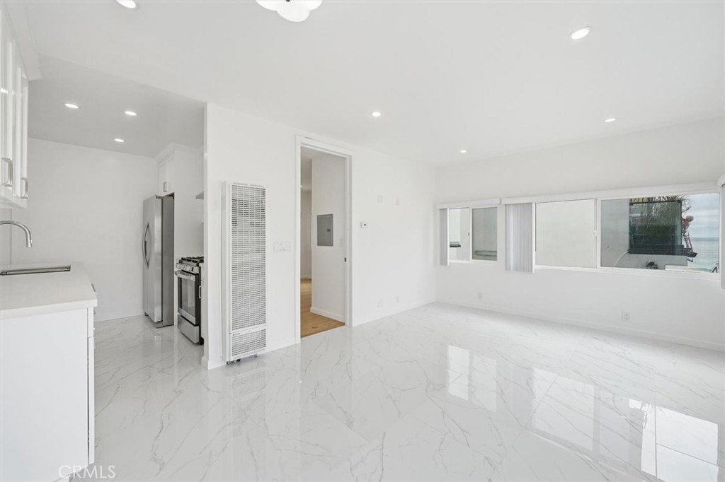 220 39th Street, Unit B Manhattan Beach, CA 90266 - Photo 2 of 21 a view of an empty room with a cabinet