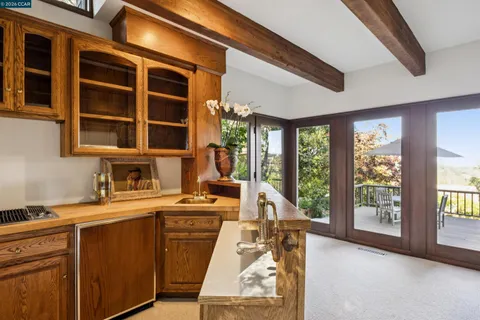 a bathroom with a sink a vanity and a mirror