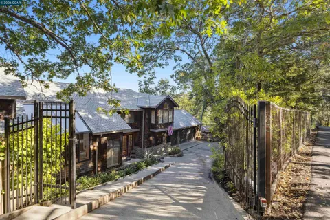a view of path along with retail shop and buildings
