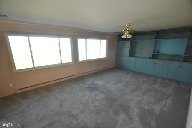 an empty room with a window