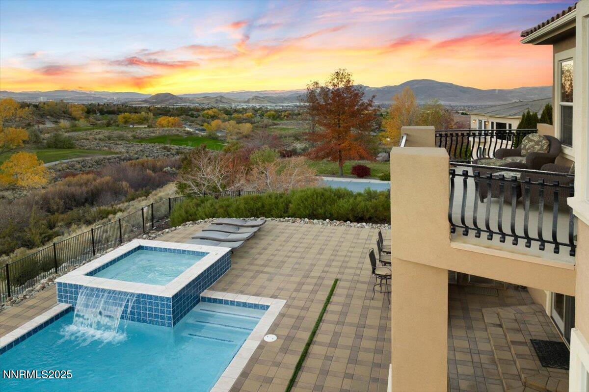 13005 Silver Wolf Road Reno, NV 89511 - Photo 7 of 40 a view of a terrace with a table and chairs