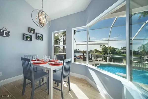 a dining room with furniture a livingroom and outdoor view