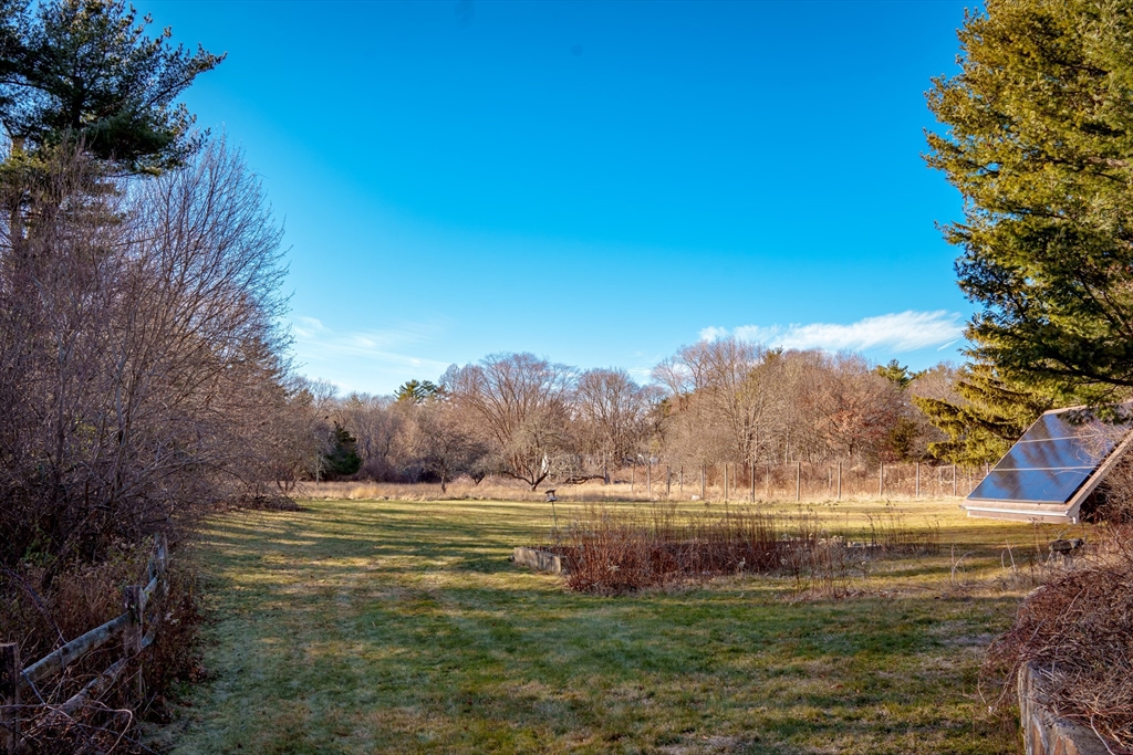 186 Hart Street Beverly, MA 01915 - Photo 2 of 3 a view of a lake with a yard