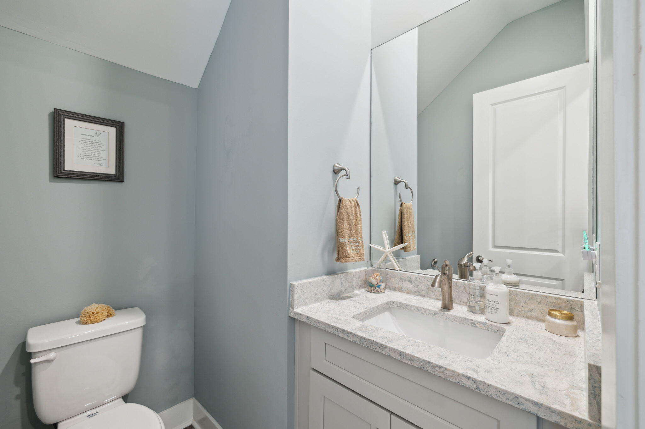 38 Constant Avenue Santa Rosa Beach, FL 32459 - Photo 12 of 36 a bathroom with a granite countertop toilet sink and mirror