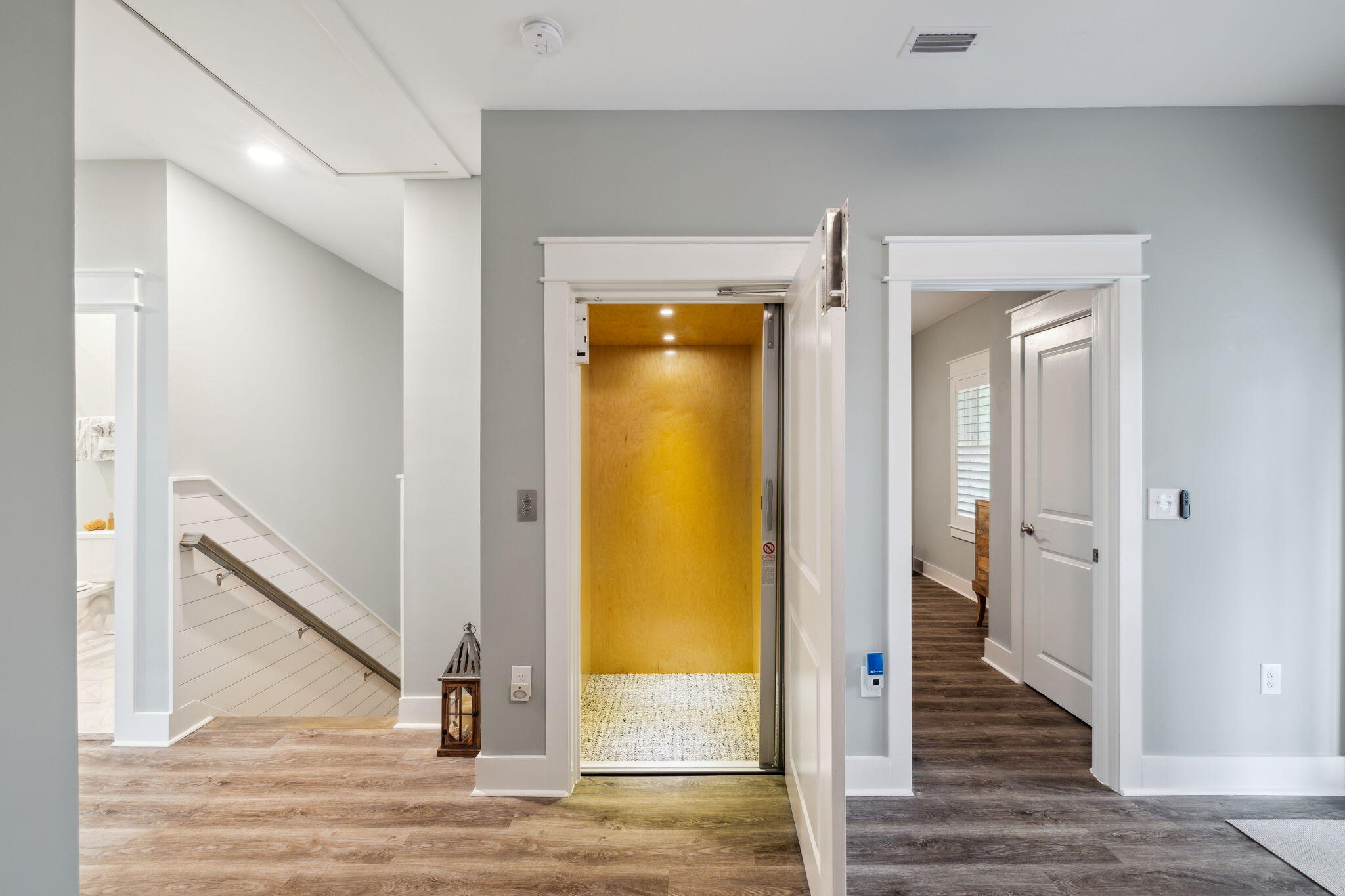 38 Constant Avenue Santa Rosa Beach, FL 32459 - Photo 19 of 36 a view of a hallway with wooden floor and door