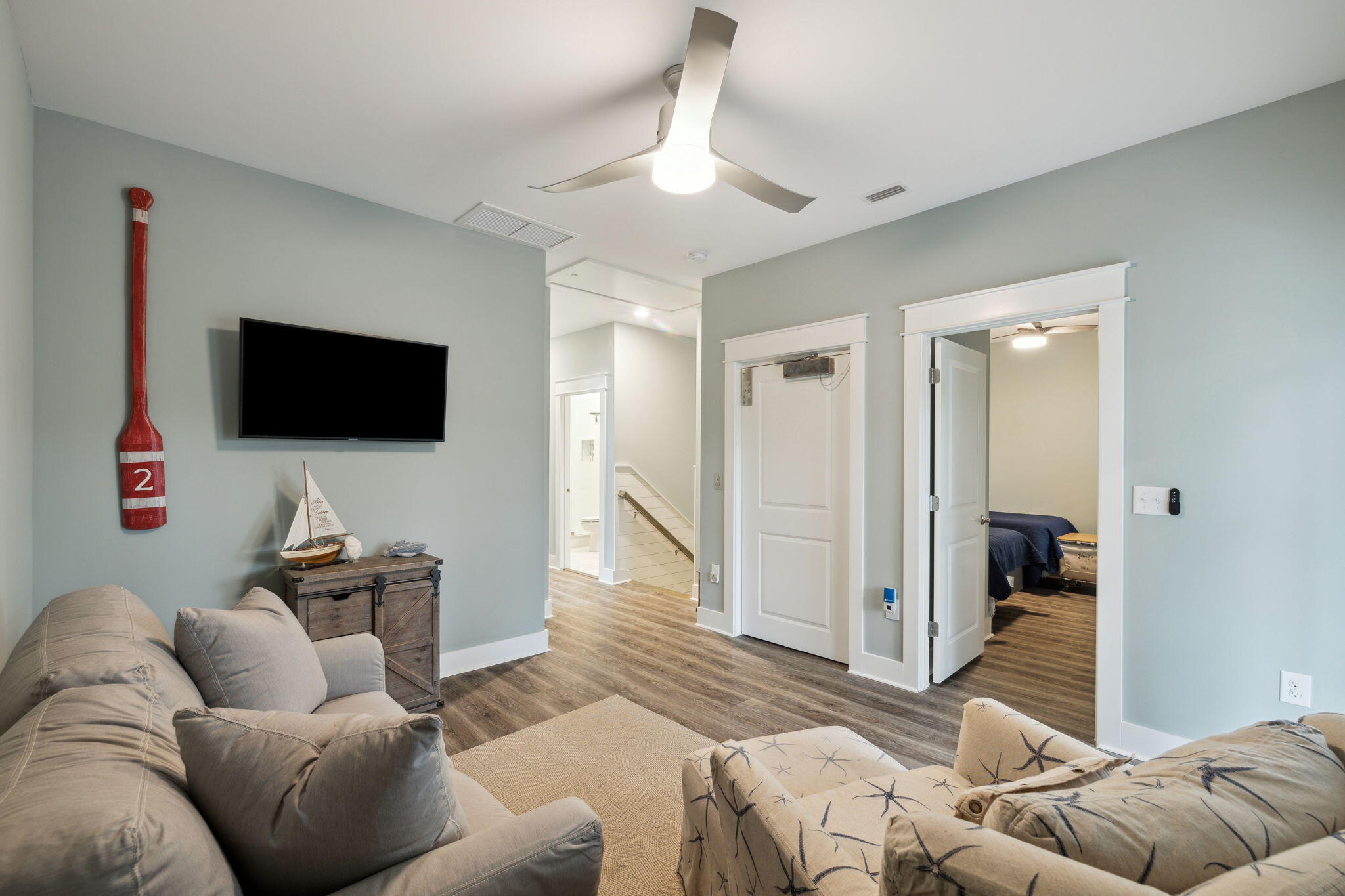 38 Constant Avenue Santa Rosa Beach, FL 32459 - Photo 21 of 36 a living room with furniture and a flat screen tv