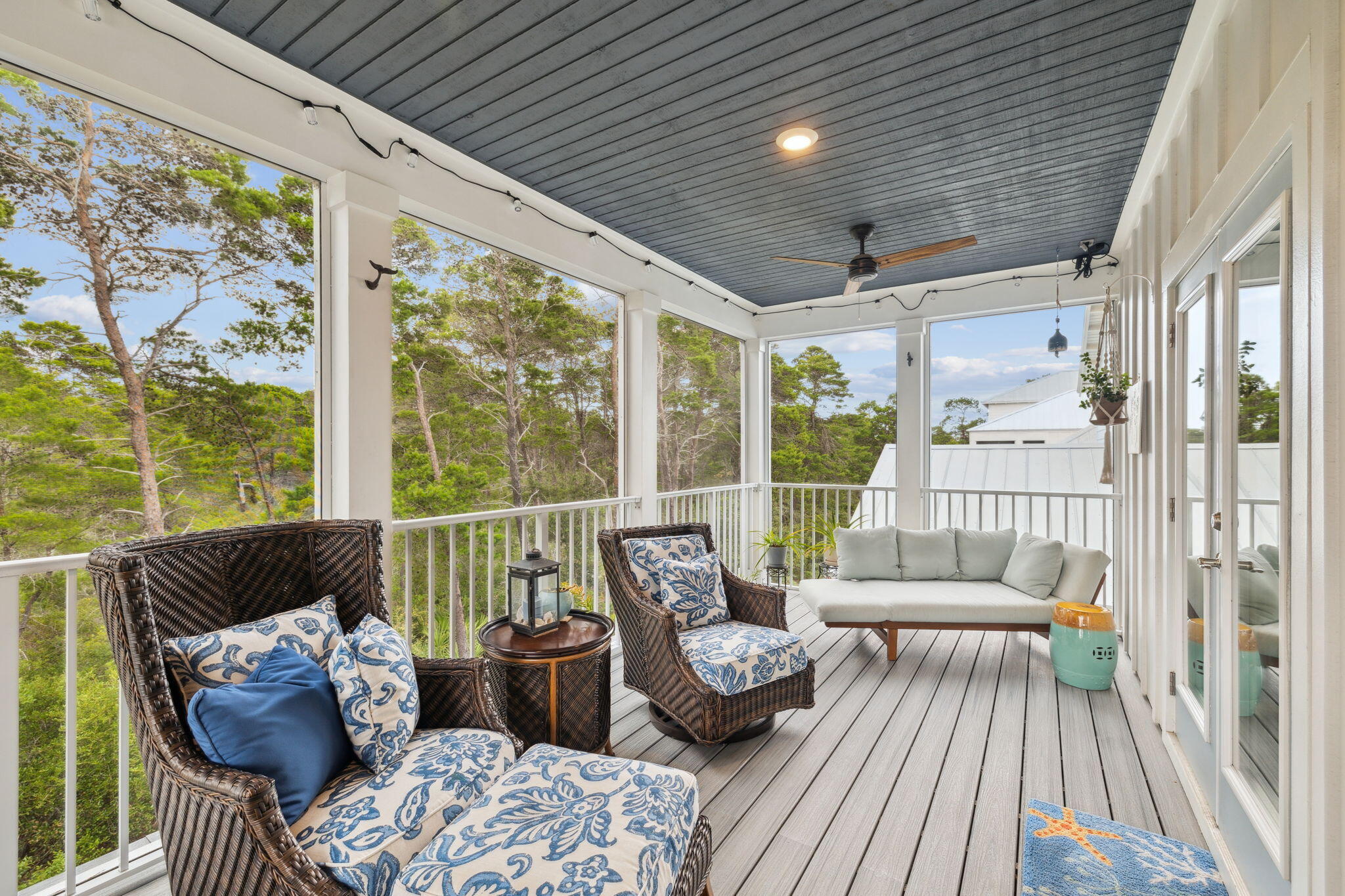 38 Constant Avenue Santa Rosa Beach, FL 32459 - Photo 23 of 36 a balcony with furniture and wooden floor