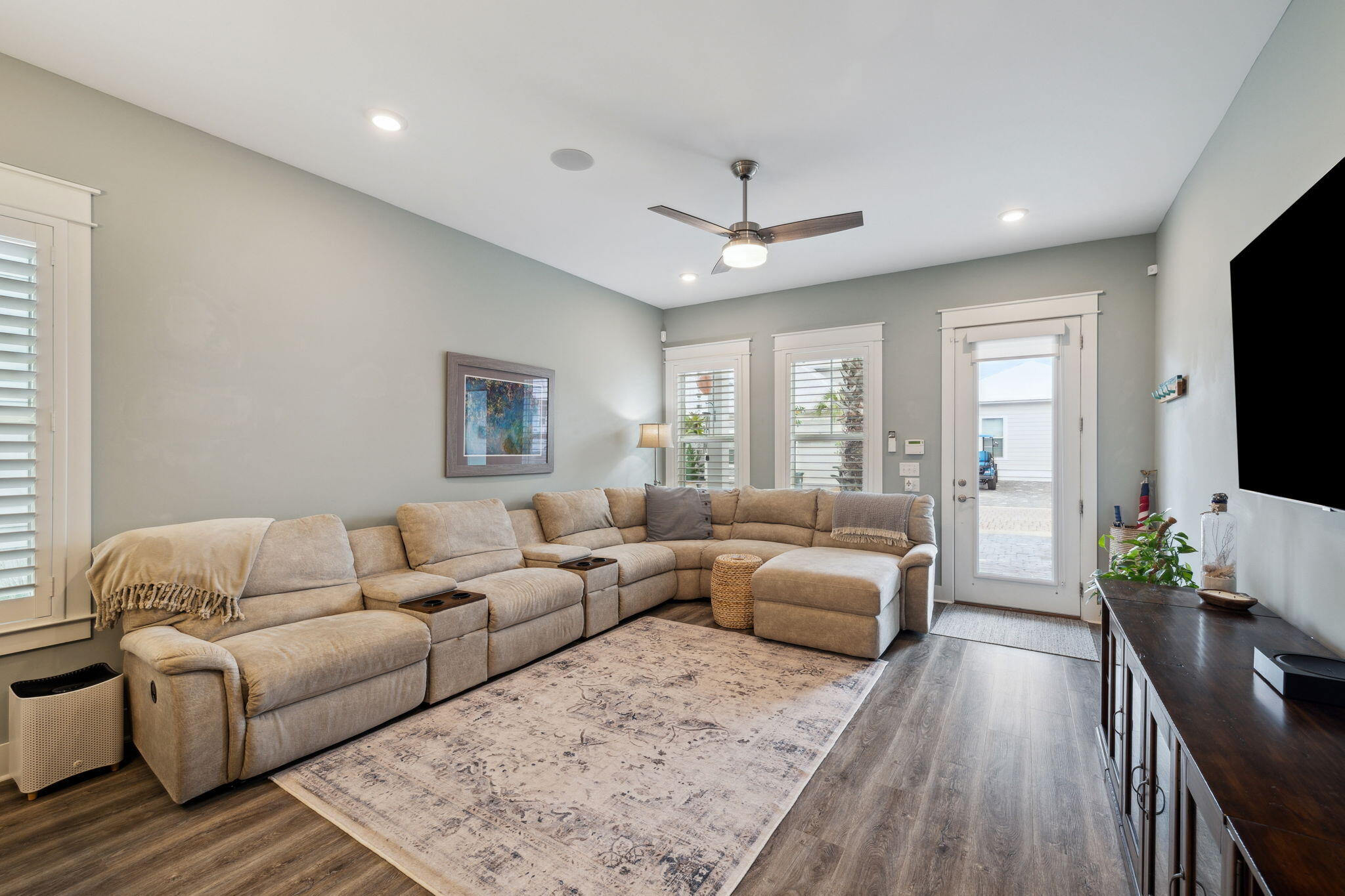 38 Constant Avenue Santa Rosa Beach, FL 32459 - Photo 5 of 36 a living room with furniture flat screen tv and windows