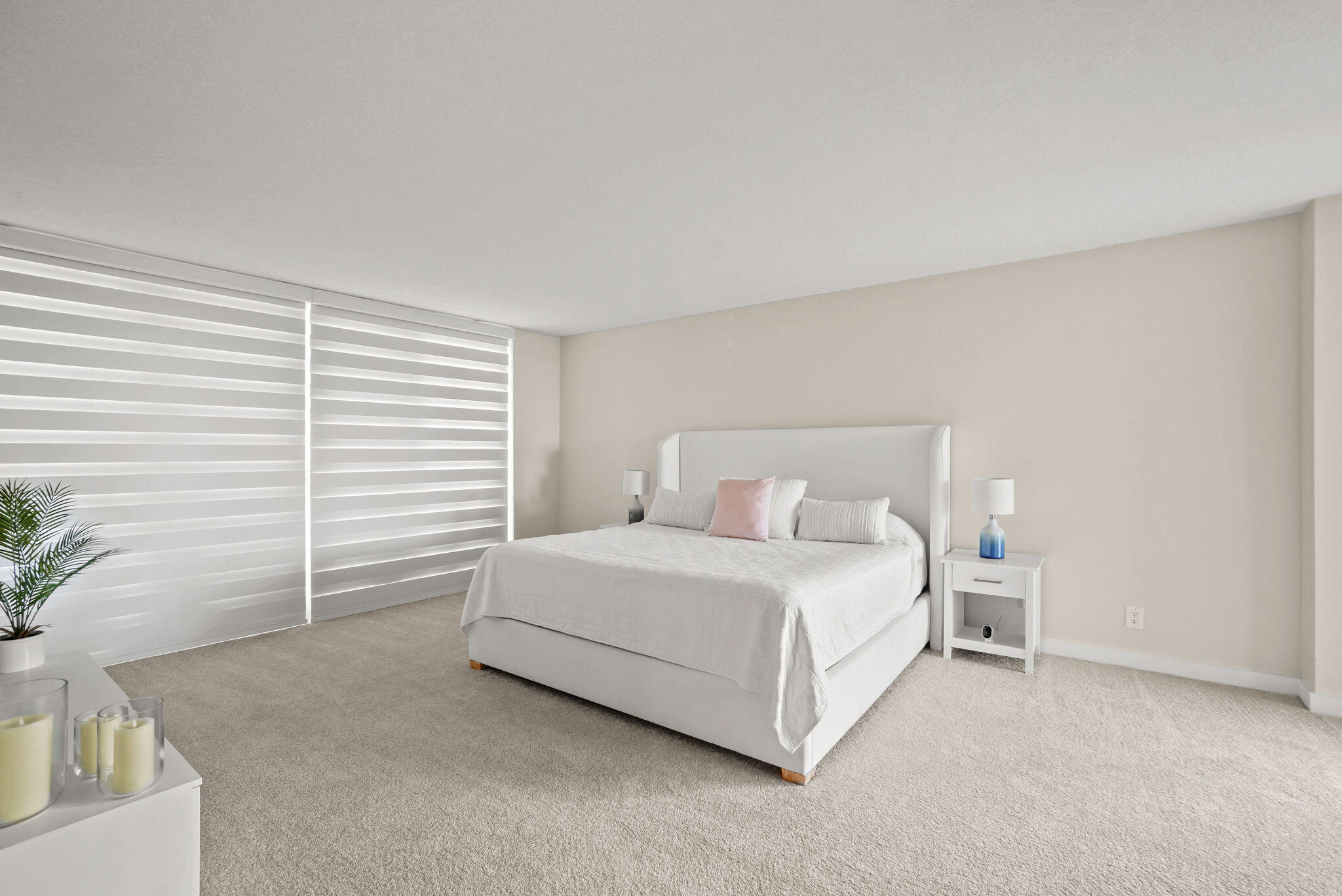 3440 South Ocean Boulevard, Unit 105S Palm Beach, FL 33480 - Photo 29 of 77 a large white bed in a white room