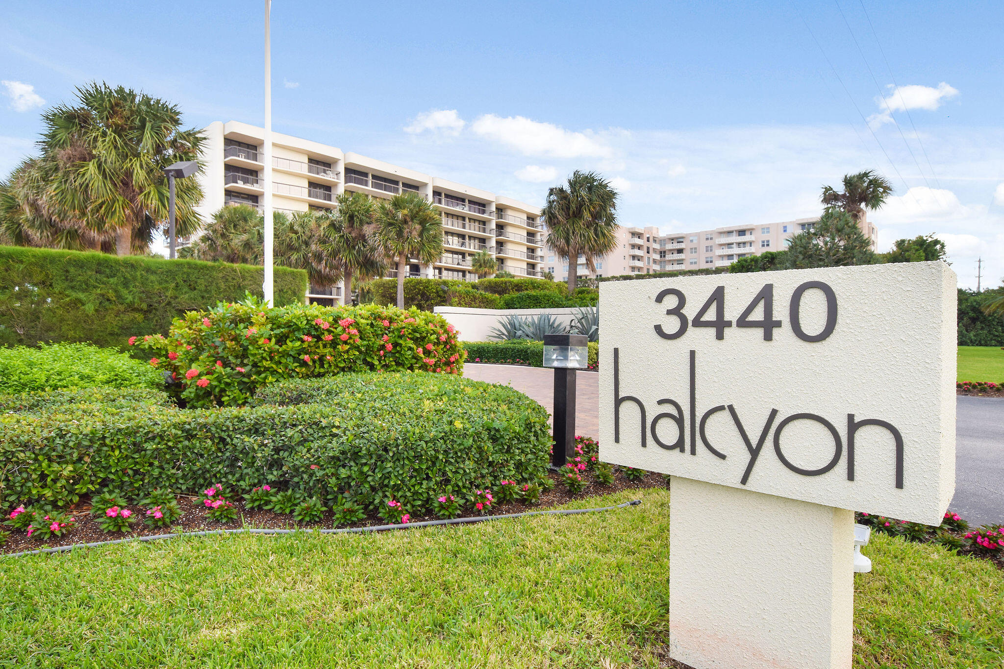 3440 South Ocean Boulevard, Unit 105S Palm Beach, FL 33480 - Photo 40 of 77 a view of a sign board with a big yard