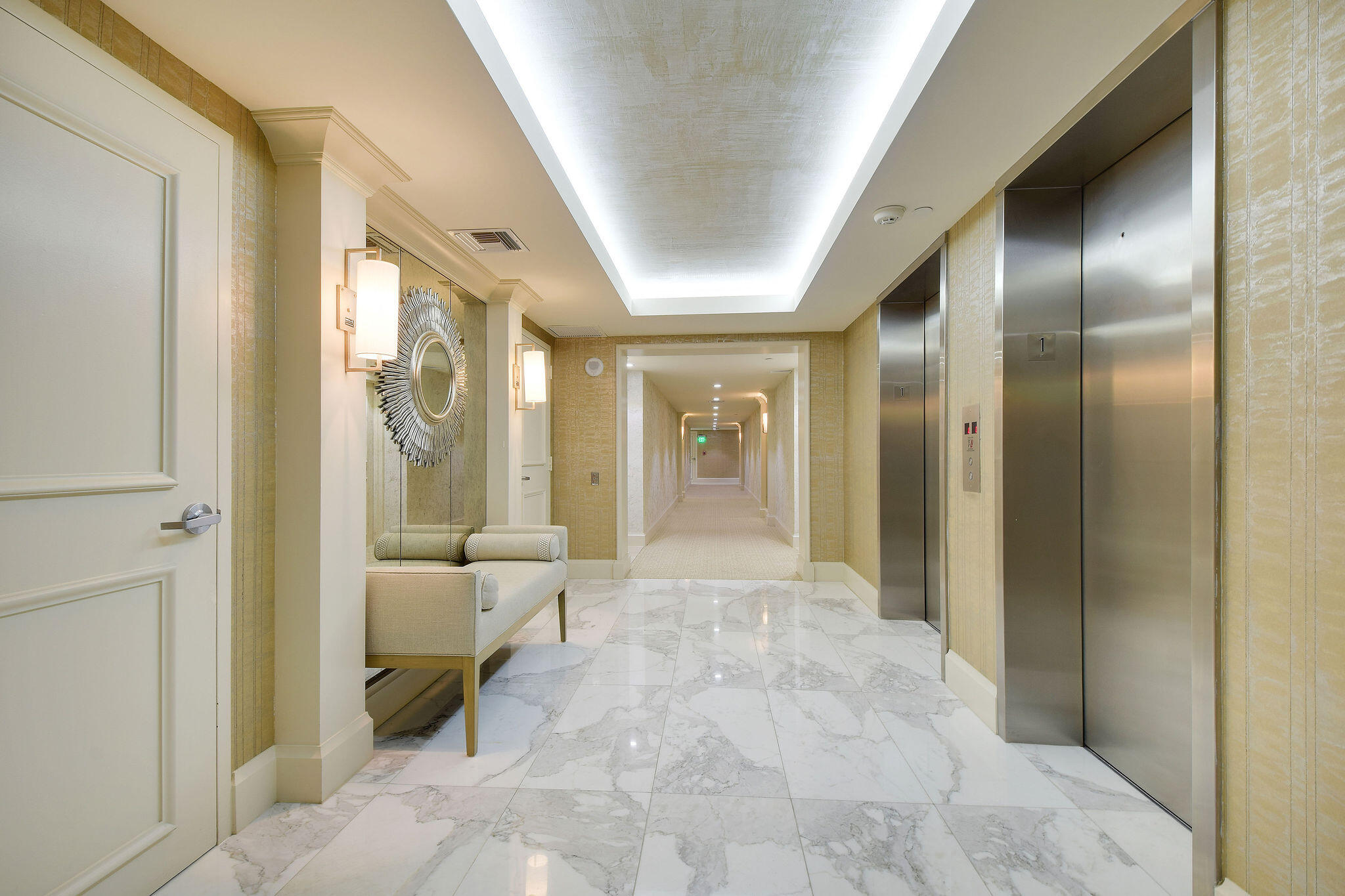 3440 South Ocean Boulevard, Unit 105S Palm Beach, FL 33480 - Photo 41 of 77 a view of a hallway with bathroom and a glass door shower
